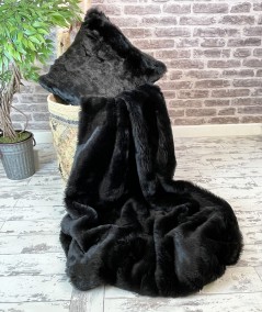 Large plain black faux fur throw and cushion