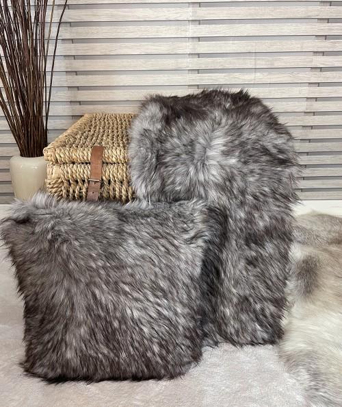 Luxury brown fur blanket with fur cushion