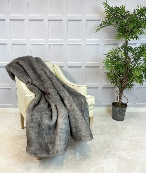 Grey fur blanket or bedspread