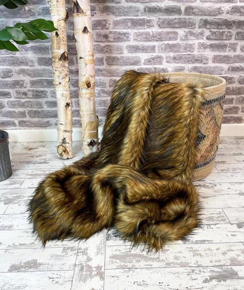 Long haired brown faux fur bedspread