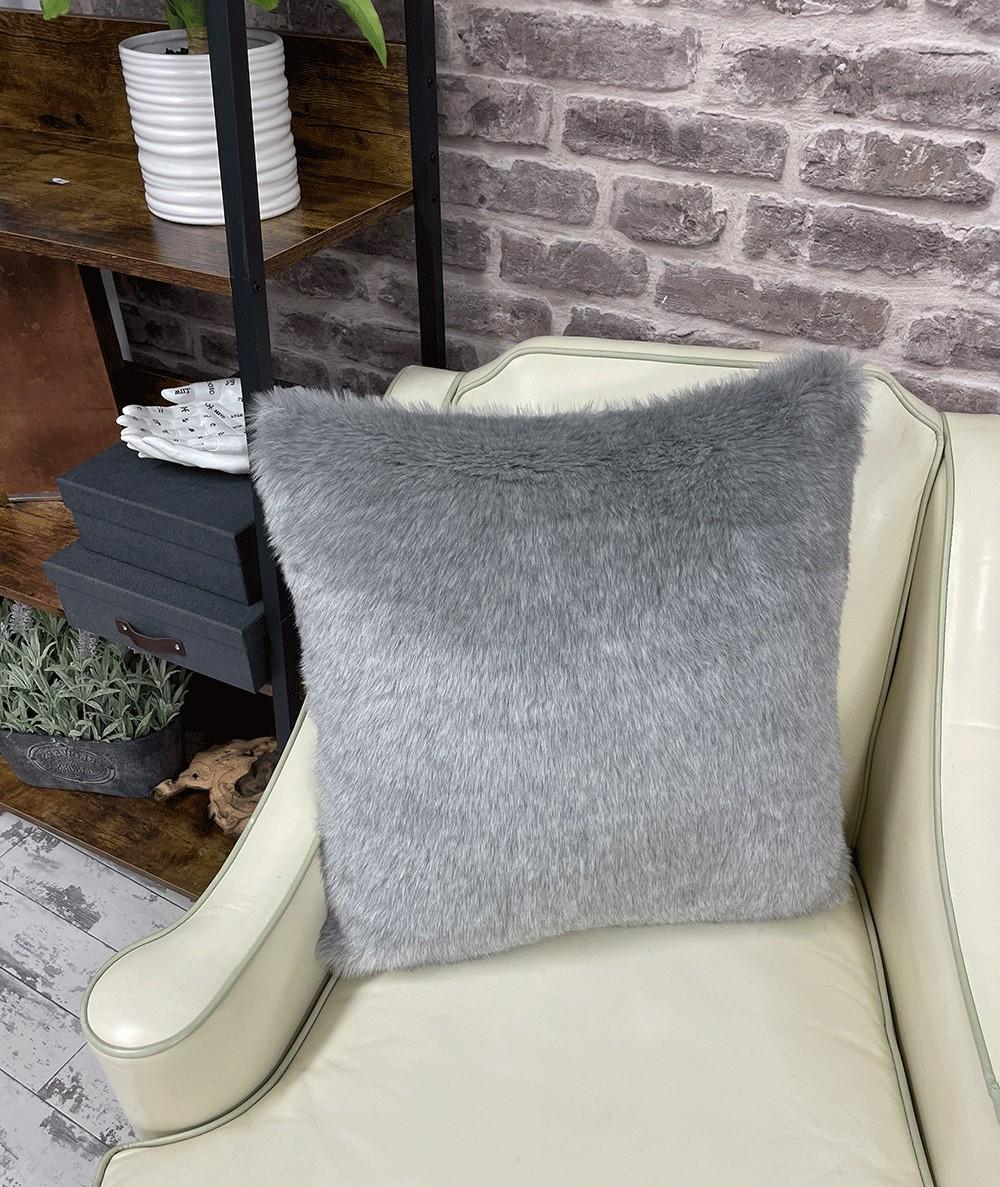 Light grey fur cushions