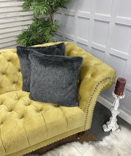 Plain dark grey faux fur cushions