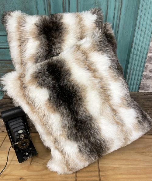 Short haired brown and cream striped faux fur cushions