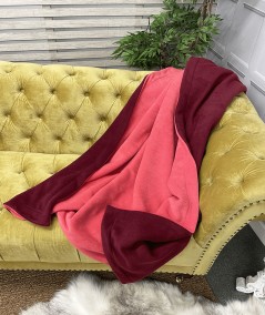 maroon and pink reversible throw