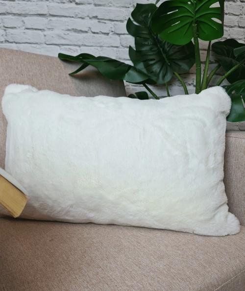 Cream rectangular faux fur cushions