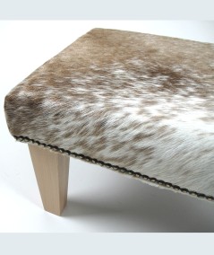 Beige brindle hair on hide footrest 313