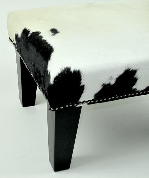 Modern rectangular cream and black cow skin footstool 325