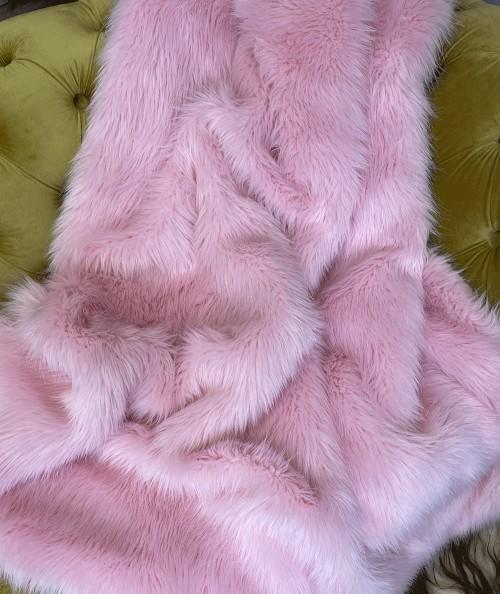 Sumptuous pale pink faux fur blanket