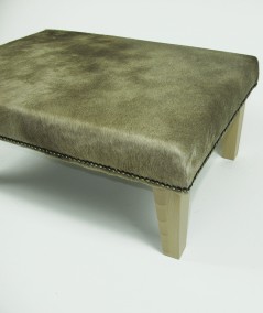 Rectangular cowhide footstool in beige/gold